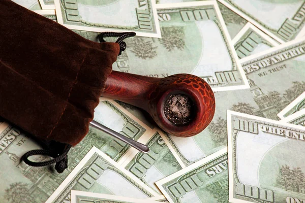 image of tobacco pipe money