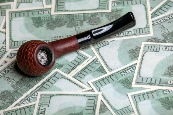 image of tobacco pipe money