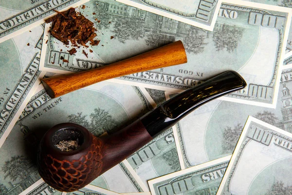 image of tobacco pipe money