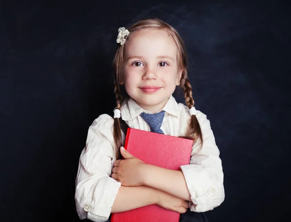 Studentessa Sorridente Con Libro Sfondo Lavagna Gesso Blu Ritratto Bambini — Foto Stock