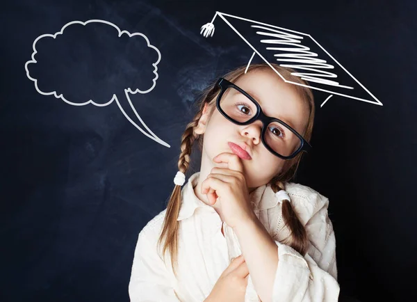 Thinking Schoolgirl Wearing Graduation Hat Classroom School Concept — Stock Photo, Image