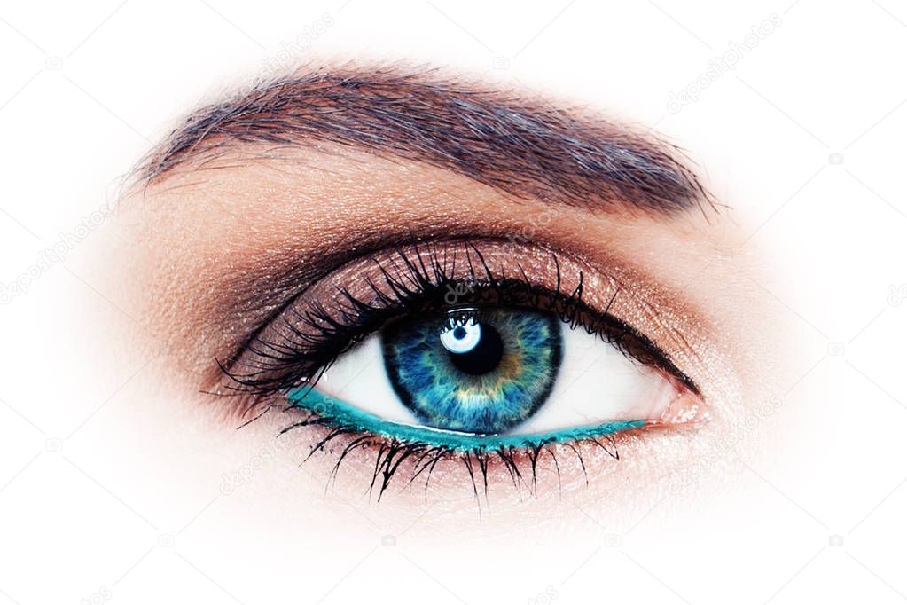 Beautiful woman eye with eyeliner and eye shadow makeup, macro