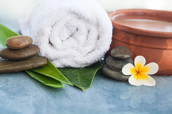 Organic Spa Flower Leaves Stones Massage Treatment Blue Background — Stock Photo, Image