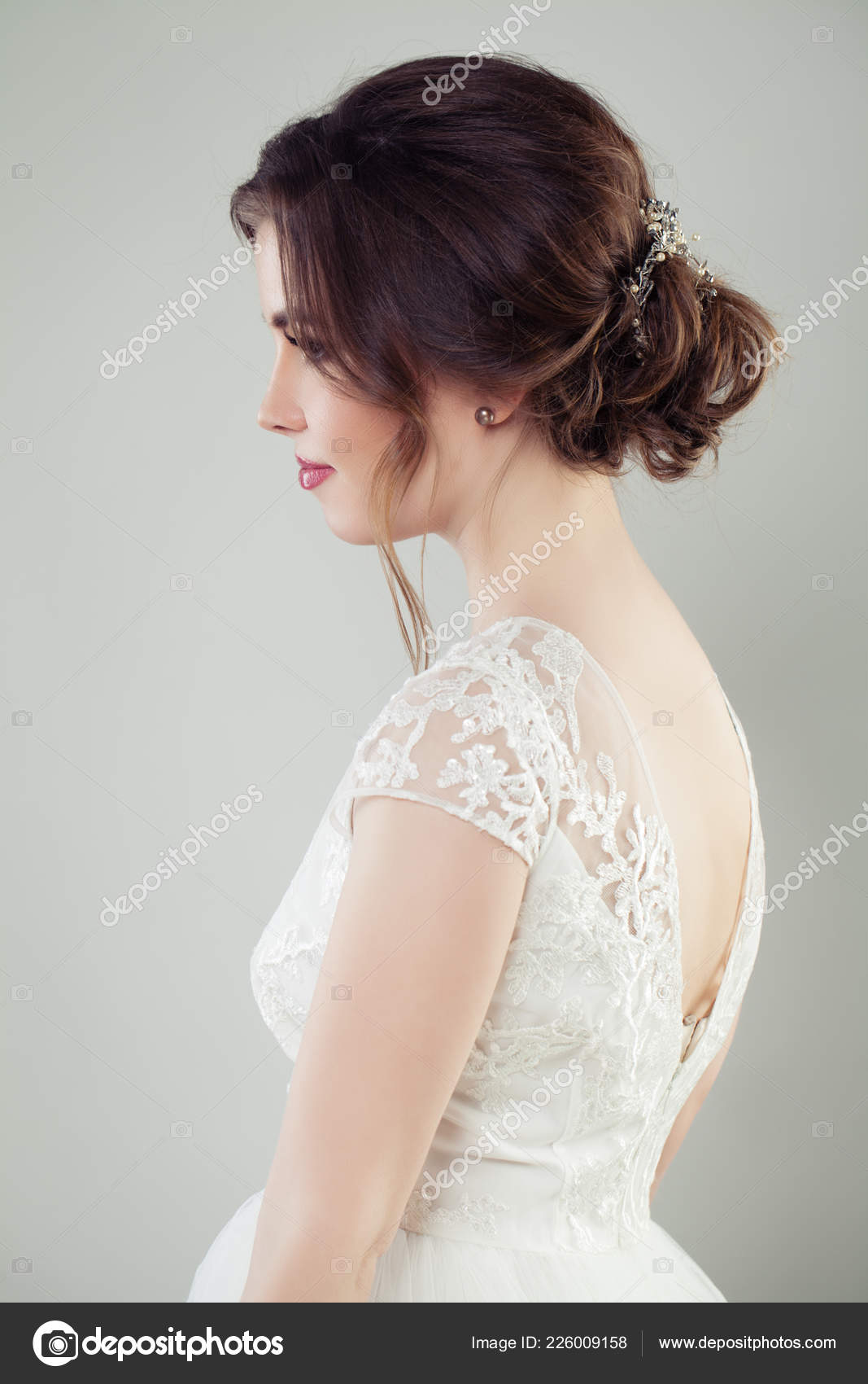 Side view of young woman with extravagant black makeup and hairstyle. -  Stock Image - Everypixel