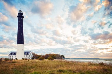 Saaremaa island, Estonia. Sorve lighthouse on the Baltic sea coast clipart