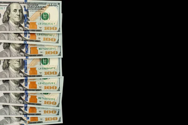 Środki pieniężne nam Dolar pieniądze granicy na czarnym tle z miejsca kopii — Zdjęcie stockowe