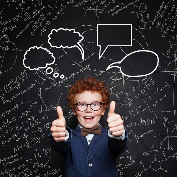 Happy smart child student on blackboard background with science — Stock Photo, Image