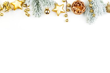 Noel sınır kompozisyonu. Altın süslemeler ve yeşil köknar dalı