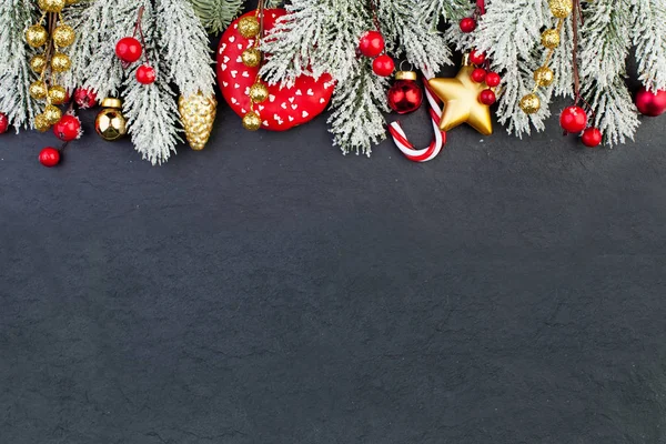 Bright colorful Christmas border with Xmas decor on black — Stock Photo, Image