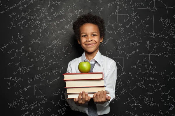 Smart Black Child Student Smiling Holding Books Green Apple Blackboard — Stock Photo, Image