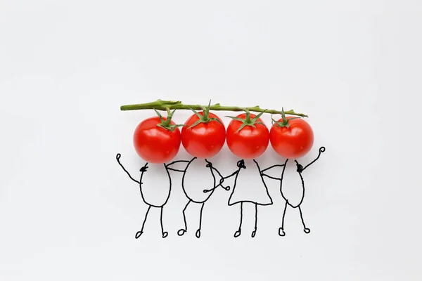 cherry tomatoes with hand drawing shapes of friends