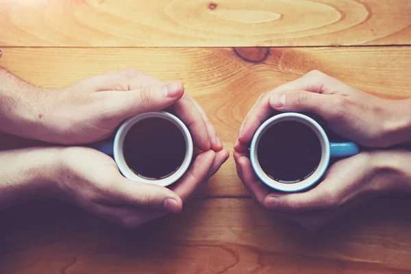 Hands Couple Two Cups Coffee Wooden Table Elevated View — Stock Photo, Image