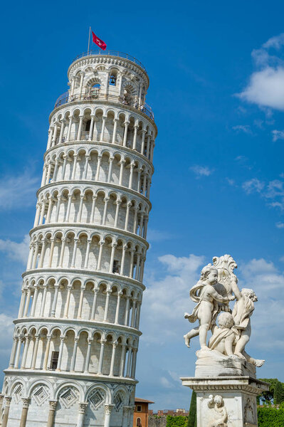 Putti Fountain and Pisa Tower vertical photo