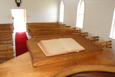 Close view of the platform used for supporting the preacher's bible and religious text during ministries.  clipart