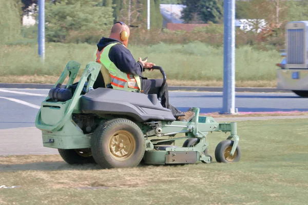 Employee Cutting City Grass Texting While Driving Machine — Stock Photo, Image