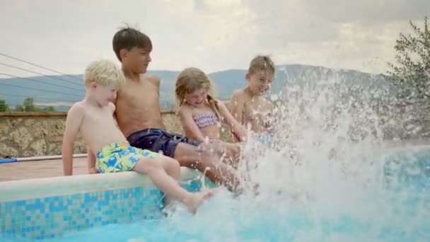 Three Adorable Happy Kids Emerging Poolside Laughing — Stock Video