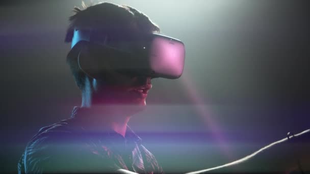 Gamer In VR Headset Playing In Bright Lights — Stock Video