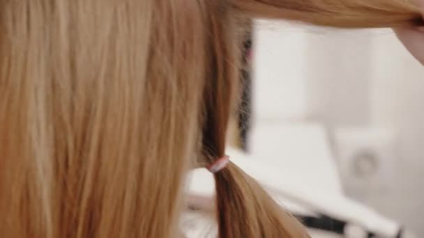 Stylist Red Nails Combing Long Hair Blonde Girl She Makes — Stock Video
