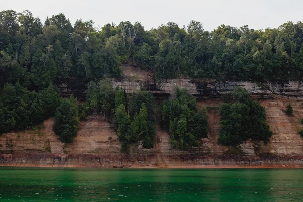 Pictured rocks national park on the Lake Superior, USA. Colorful textured rocks background