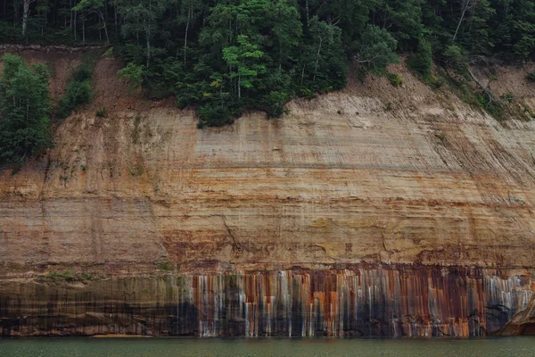 Pictured rocks national park on the Lake Superior, USA. Colorful textured rocks background