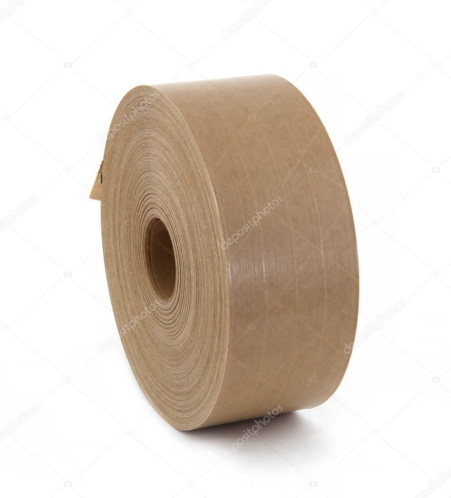 Reel with brown paper stickers labels isolated on the white background. Labels for thermo printer for bar codes to mark goods. They are environmentally friendly and recyclable.