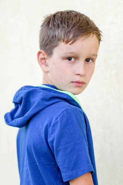 Portrait of a boy in the summer outdoors