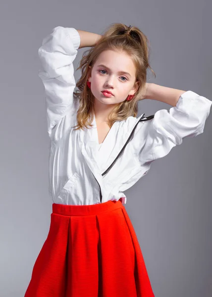 portrait of little model girl in studio