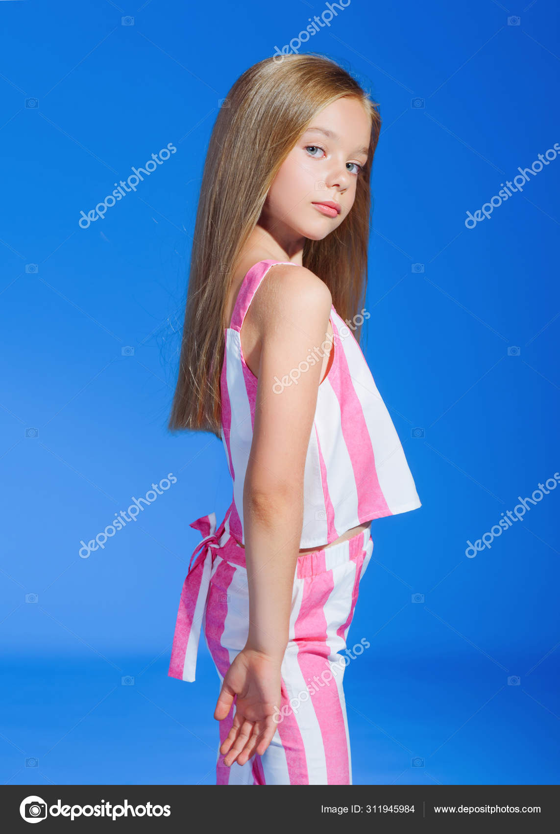 litle model Portrait of little model girl in studio — Stock Photo © zagorodnaya  #311945984