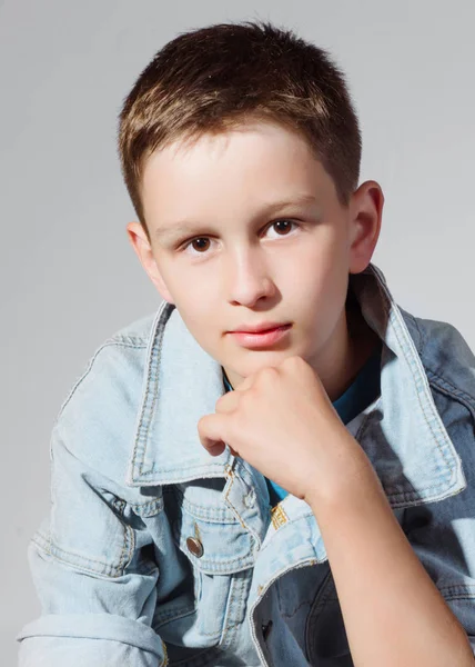 Portrait of a little fashionable boy in the studio — Stock Photo, Image