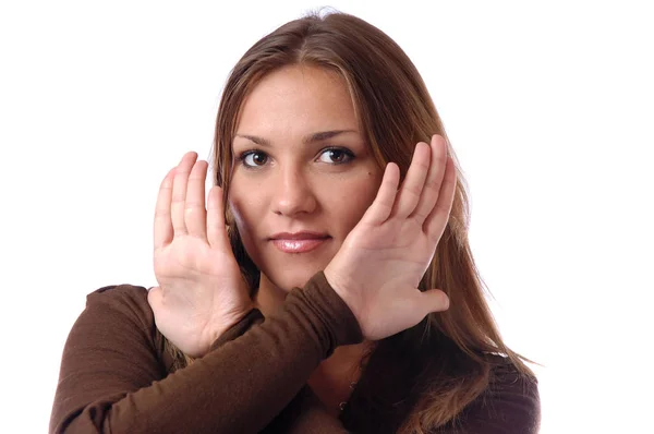 Mädchen zeigt Handflächen nahe dem Gesicht — Stockfoto