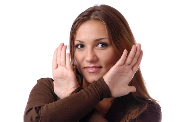 Chica muestra las palmas cerca de la cara — Foto de Stock