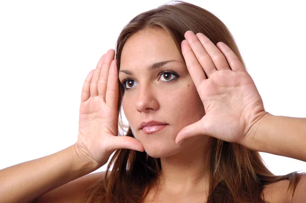 Chica muestra las palmas cerca de la cara — Foto de Stock