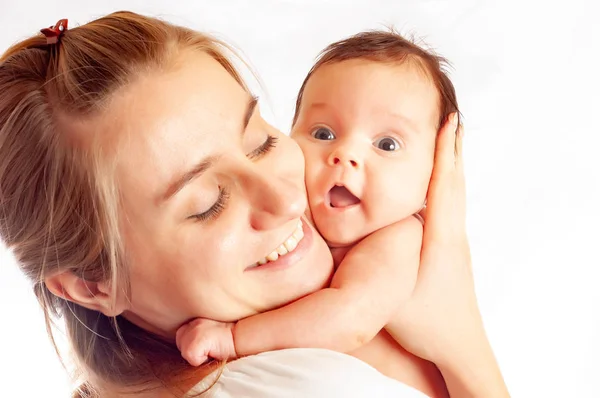 Close-up a caring young mother wipes girl — Stock Photo, Image