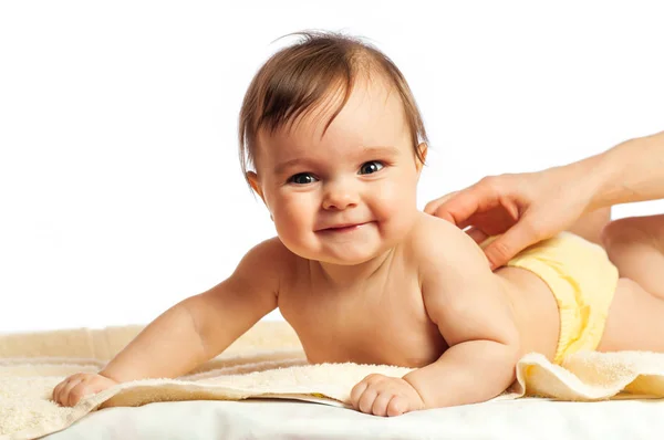 Close-up van een lachend meisje van zes maanden oud — Stockfoto