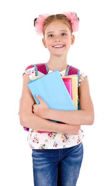 学校のバッグのバックパックと白い背景の教育概念に分離された本ハッピー学童少女の笑みを浮かべての肖像画 — ストック写真