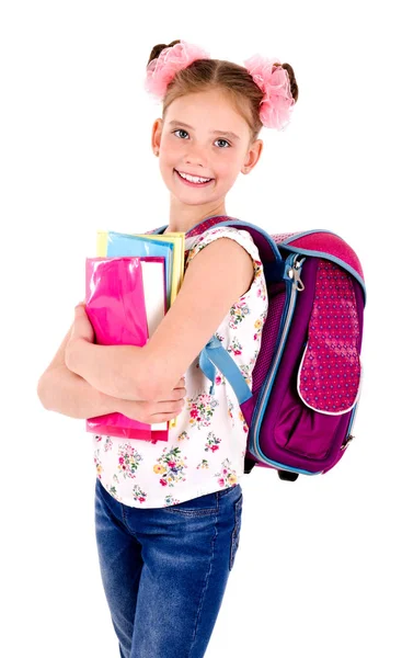 学校のバッグのバックパックと白い背景の教育概念に分離された本ハッピー学童少女の笑みを浮かべての肖像画 — ストック写真