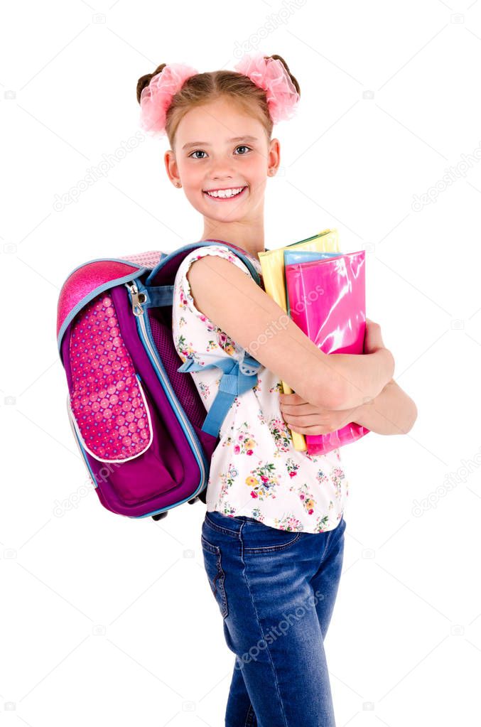 Portrait of smiling happy school girl child with school bag backpack and books isolated on a white background education concept