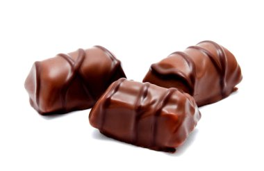 Çikolata şekerleme tatlılar ürün yelpazesine izole beyaz bir arka plan üzerinde