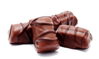 Çikolata şekerleme tatlılar ürün yelpazesine izole beyaz bir arka plan üzerinde