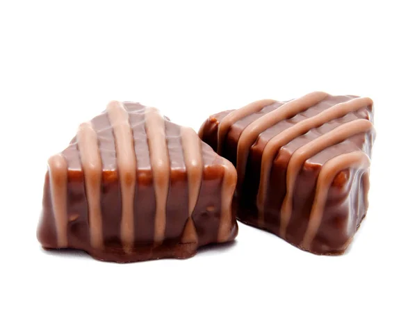 各种各样的巧克力糖果甜食孤立在白色背景上 — 图库照片