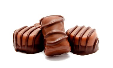 Çikolata şekerleme tatlılar ürün yelpazesine izole beyaz bir arka plan üzerinde