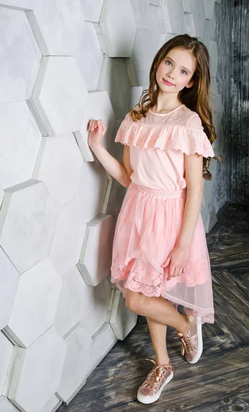 Portrait of adorable smiling little girl child schoolgirl in pri — Stock Photo, Image