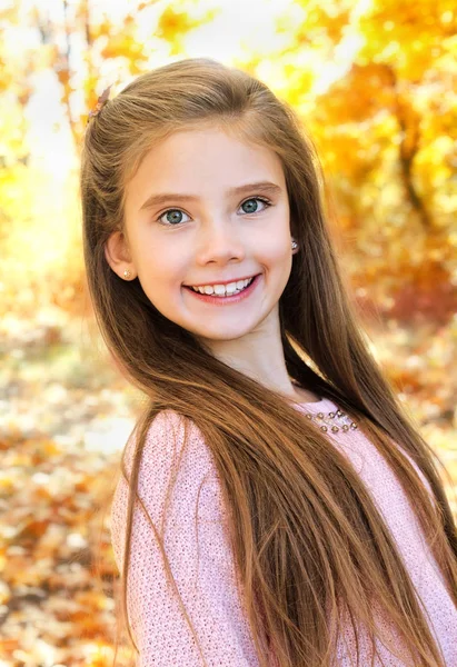 Autumn portrait of adorable smiling  little girl child with leav — Stock Photo, Image