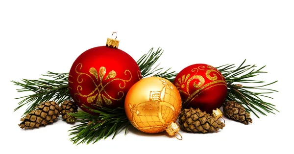 Christmas decoration golden yellow and red balls with fir cones — Stock Photo, Image