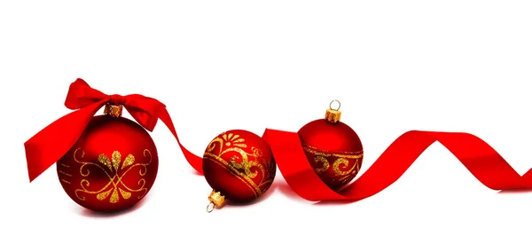 Christmas decoration red balls with ribbon isolated — Stock Photo, Image