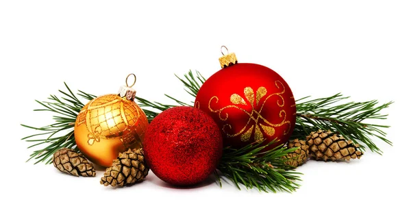 Christmas decoration golden yellow and red balls with fir cones — Stock Photo, Image