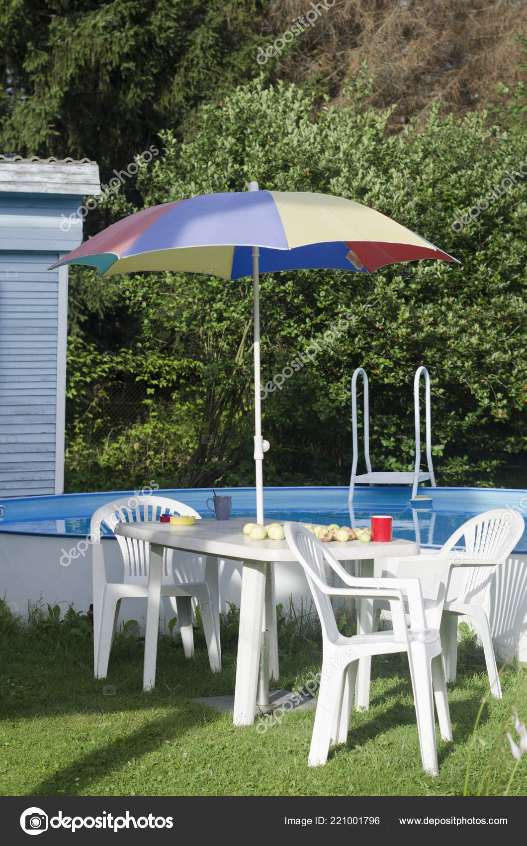 Plastic Table Chairs Sun Umbrella Next Summer Swimming Pool Stock Plastic Table Chairs Sun Umbrella Next Summer Swimming Pool Stock Photo