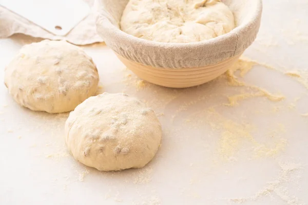 Balls of dough covered with wheat flour ready for baking. Copy space. — Stock Photo, Image