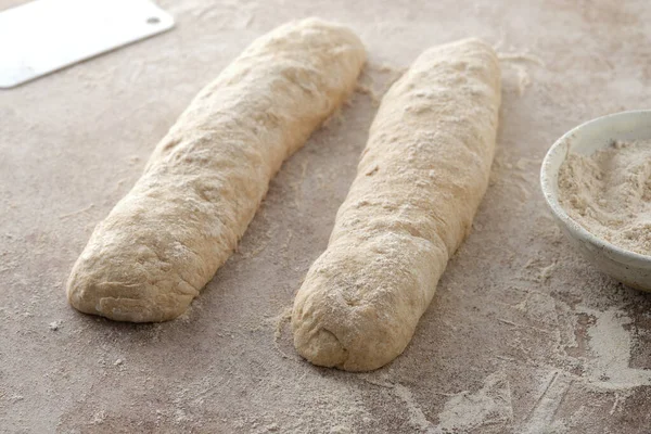 Raw baguette dough with whole grain rye flour. Copy space. — Stock Photo, Image