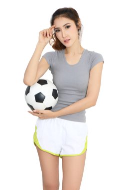 Genç Asyalı kadın futbol elinde tutan spor aşınmaya